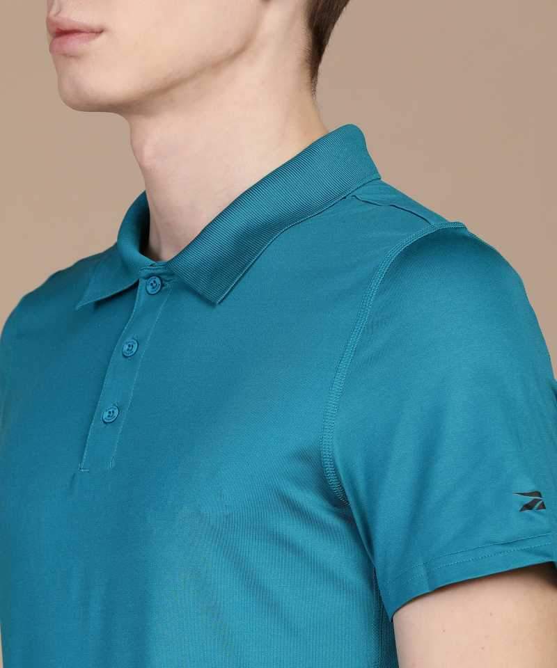 Reebok Solid Men Polo Neck Green T-Shirt